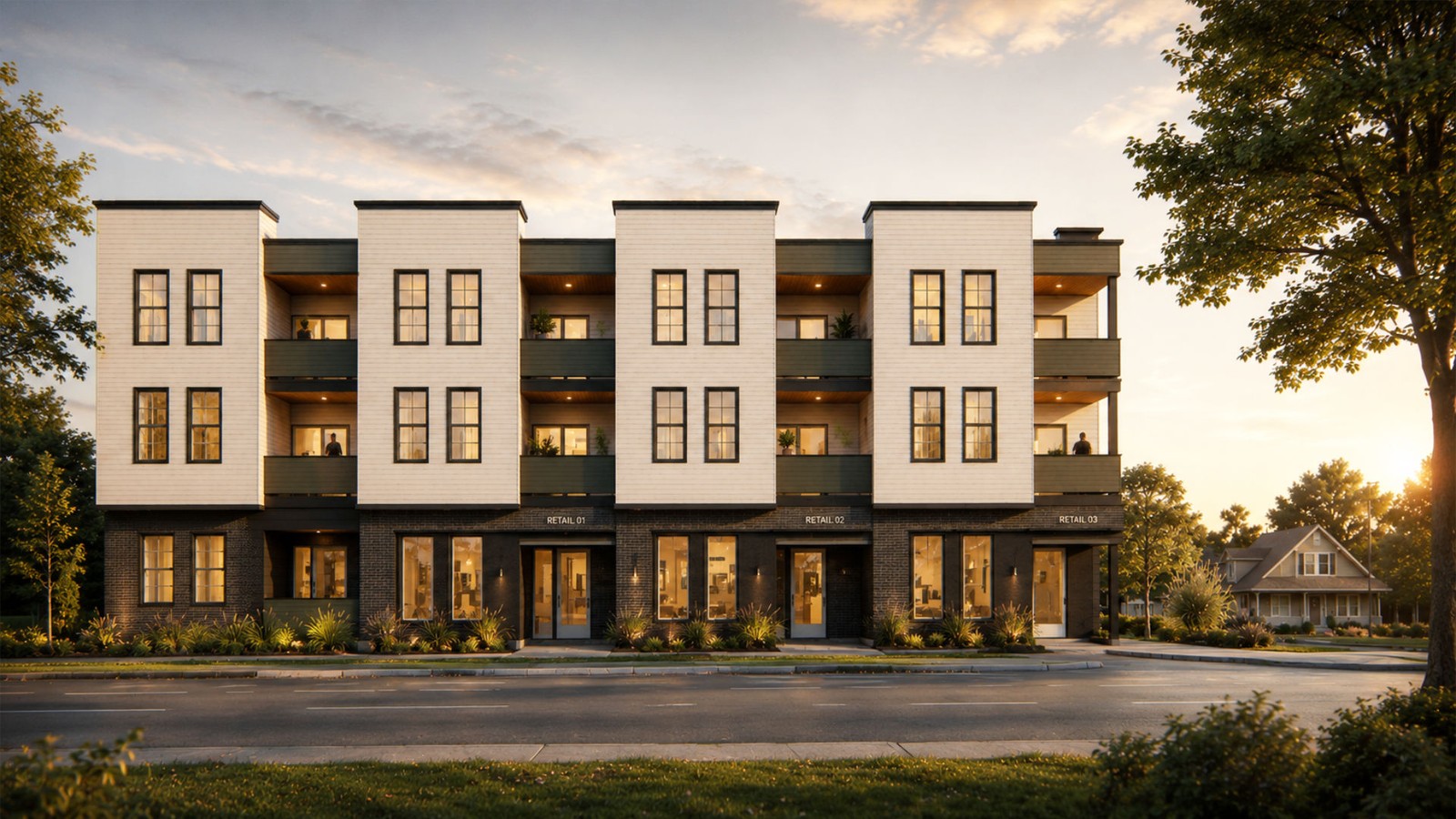 Dusk exterior render of the Columbia Boulevard mixed-use building, a three-story structure with white vertical massing, dark recessed balconies, and ground-floor retail storefronts.