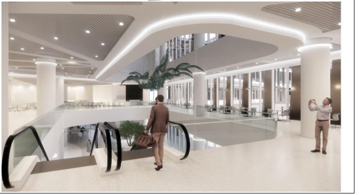 Rendered atrium lobby of Prince Mohammad University Hospital, showing a curved acoustic baffle ceiling, escalators, and a double-height glazed space.